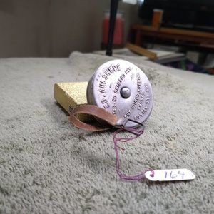 Vintage tape measure ahlswede dry goods souvenir Austin Texas